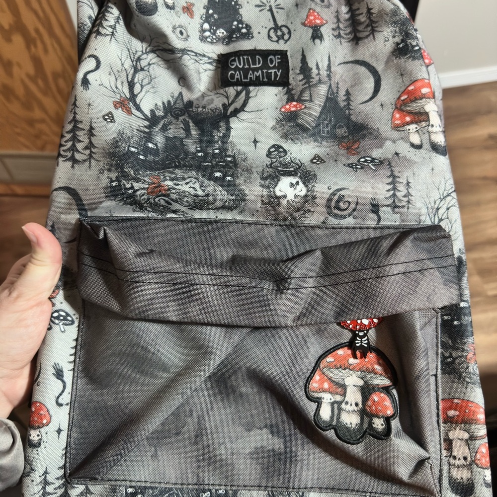 Hot Topic Gray and Red Guild of Calamity Backpack